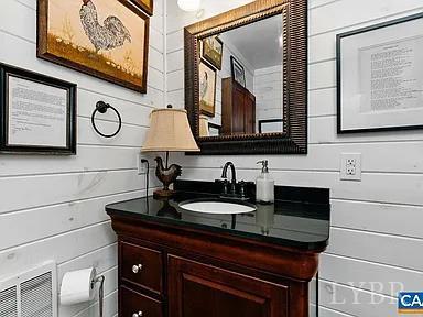 325 Old Roseland Road Roseland, VA 22967 - Photo 14 of 69 a bathroom with a sink and a mirror