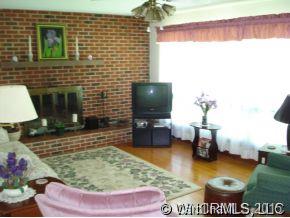567 Old Newfound Road Leicester, NC 28748 - Photo 3 of 12 a view of a swimming pool with furniture