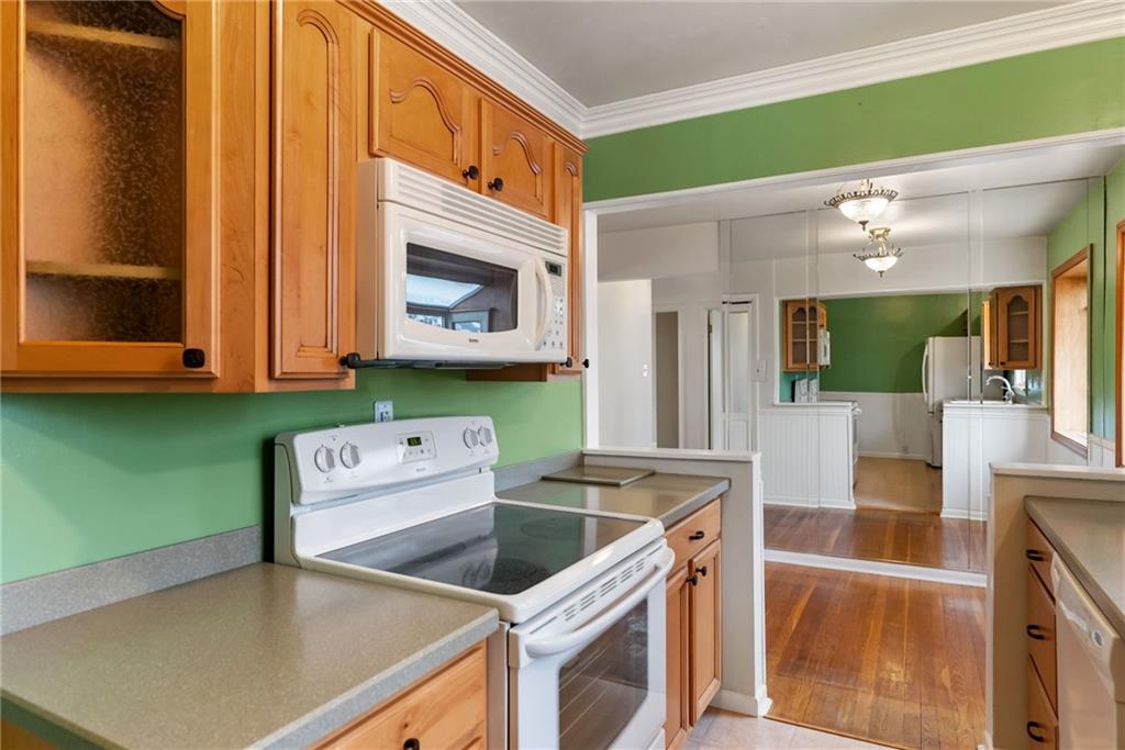 107 Marshall Drive Coraopolis, PA 15108 - Photo 13 of 32 a kitchen with a sink cabinets and window