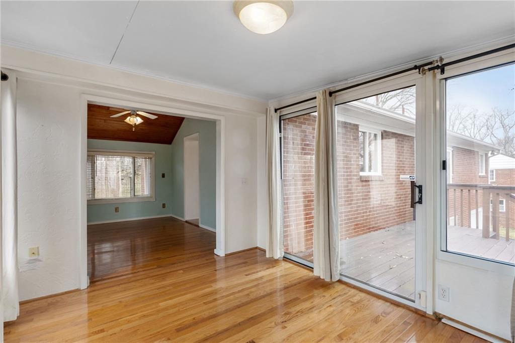 107 Marshall Drive Coraopolis, PA 15108 - Photo 18 of 32 wooden floor in an empty room with a window