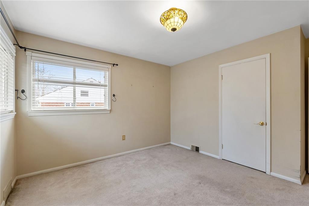 107 Marshall Drive Coraopolis, PA 15108 - Photo 21 of 32 an empty room with a window