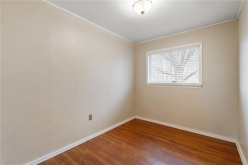 107 Marshall Drive Coraopolis, PA 15108 - Photo 22 of 32 an empty room with wooden floor and windows