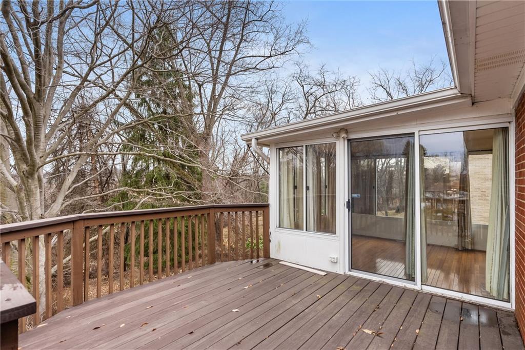 107 Marshall Drive Coraopolis, PA 15108 - Photo 26 of 32 a view of a wooden deck and a yard