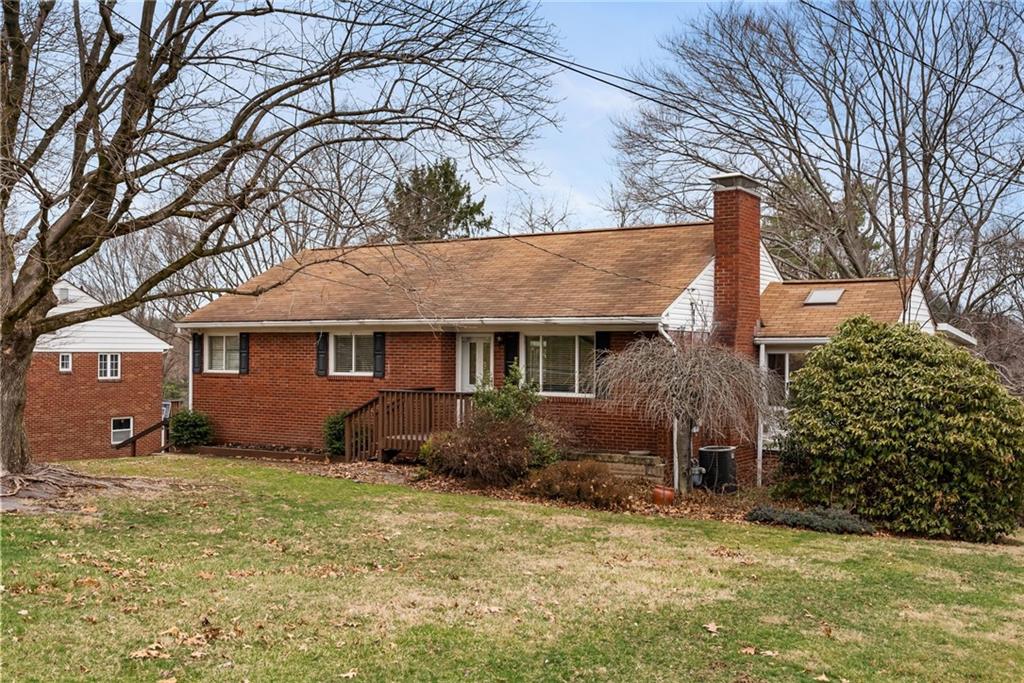 107 Marshall Drive Coraopolis, PA 15108 - Photo 3 of 32 front view of a house with a yard
