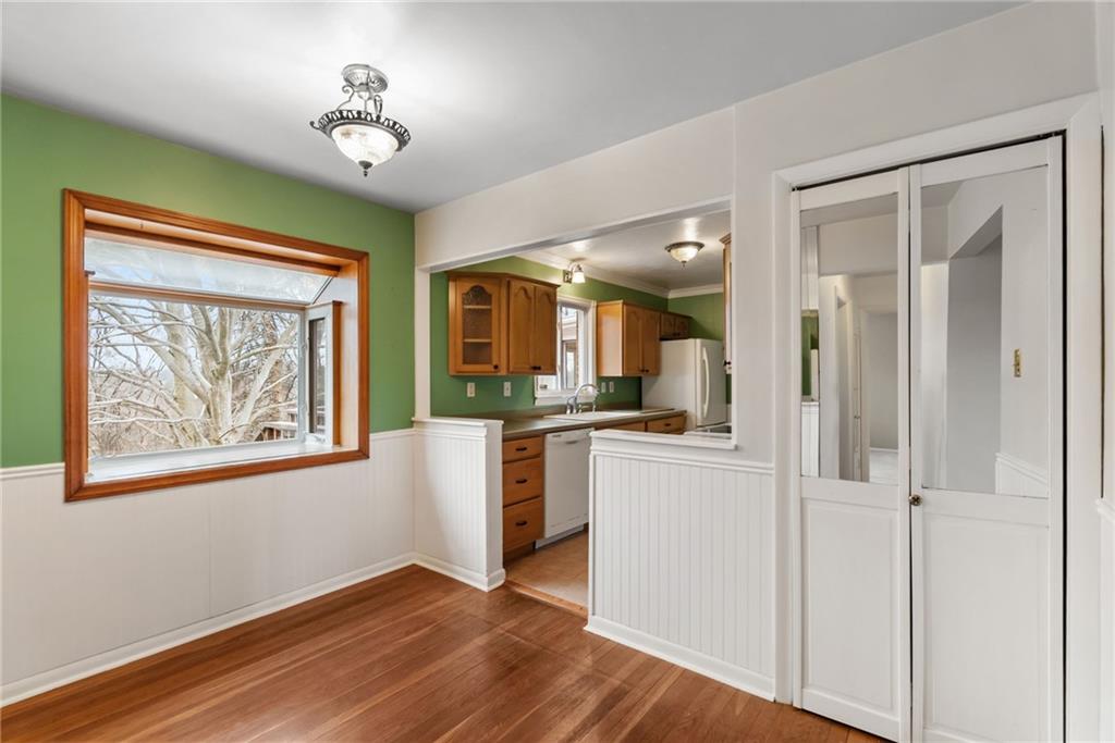 107 Marshall Drive Coraopolis, PA 15108 - Photo 8 of 32 a view of a kitchen with a window and wooden floor