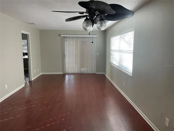 a kitchen with stainless steel appliances granite countertop a stove a refrigerator and a sink