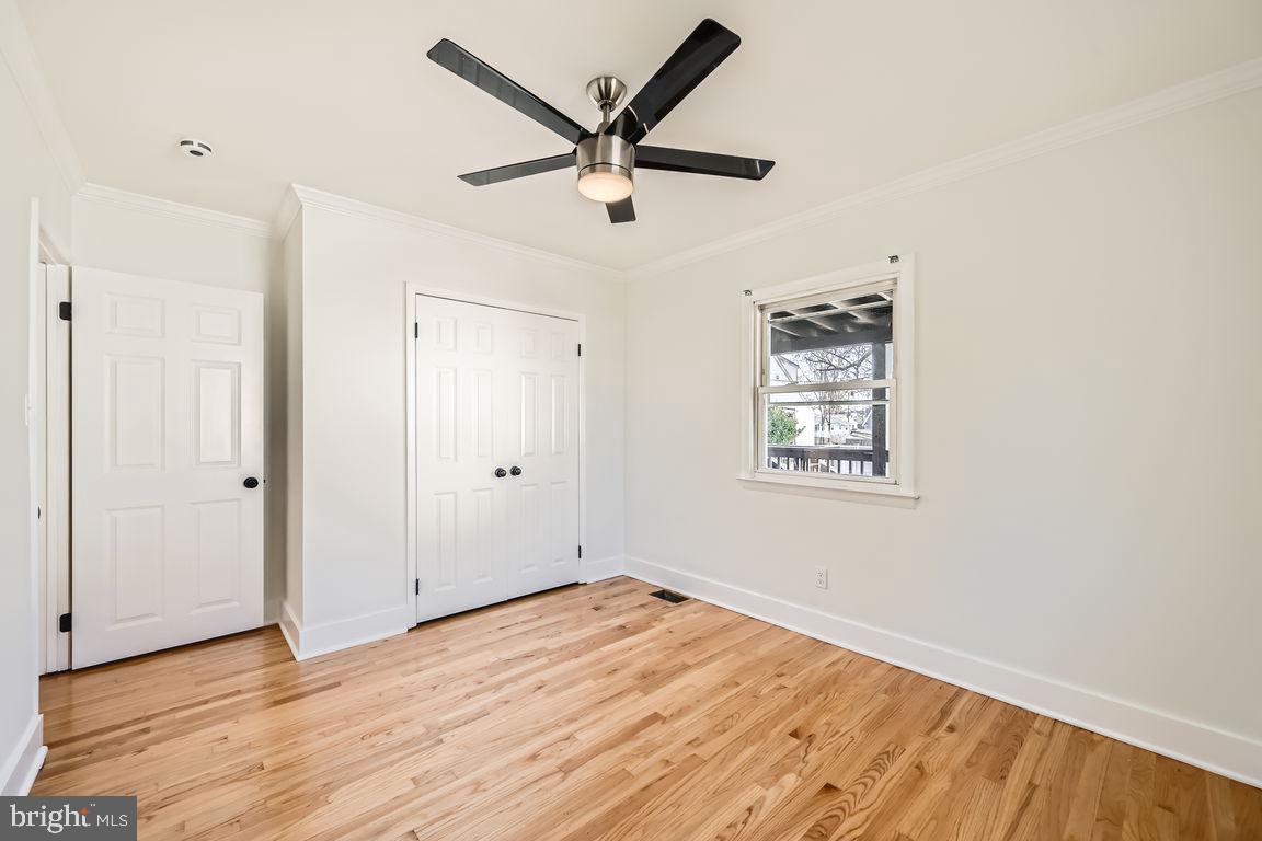 317 Townsend Road Essex, MD 21221 - Photo 12 of 28 a view of empty room with wooden floor