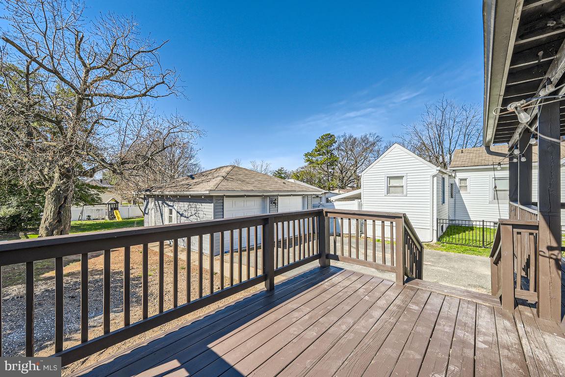 317 Townsend Road Essex, MD 21221 - Photo 24 of 28 a view of a house with a wooden deck