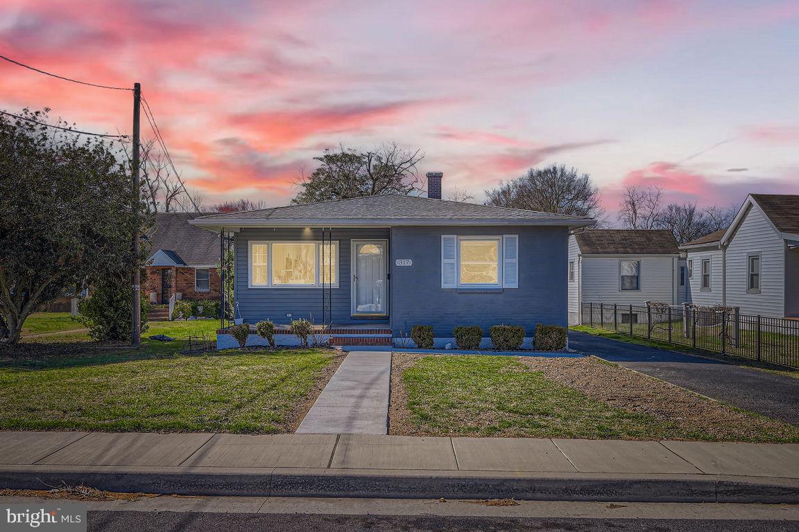 317 Townsend Road Essex, MD 21221 - Photo 28 of 28 a front view of a house with a yard
