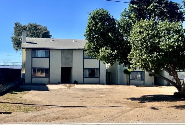 a house view with a outdoor space