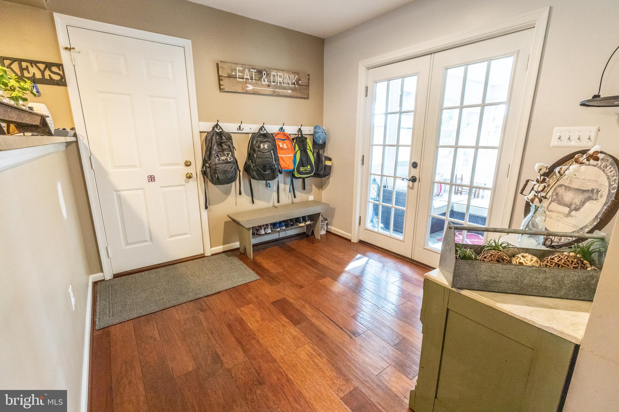 193 Quail Run Road Summit Point, WV 25446 - Photo 26 of 72 a view of a room with wooden floor and windows