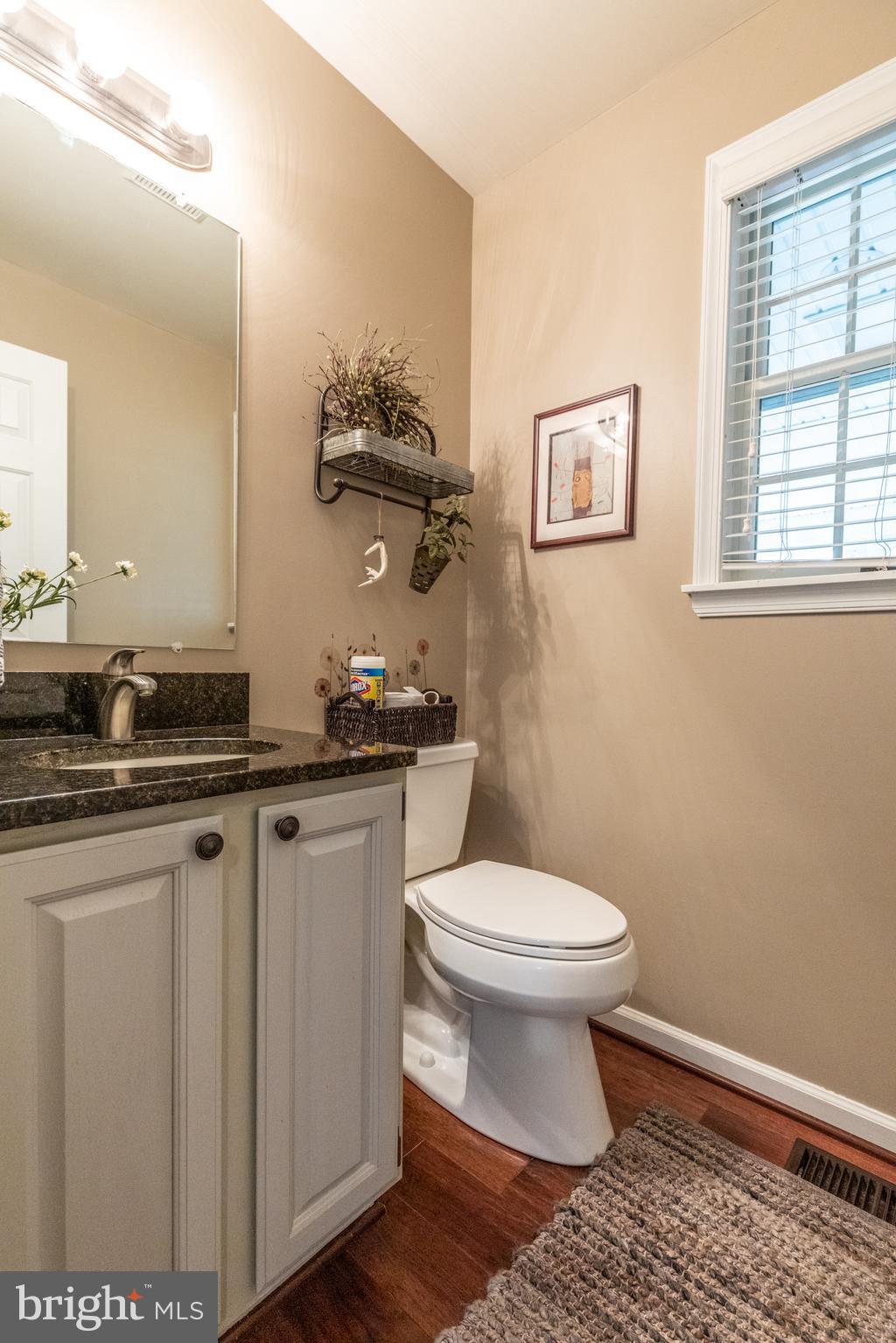 193 Quail Run Road Summit Point, WV 25446 - Photo 29 of 72 a bathroom with a sink and a toilet