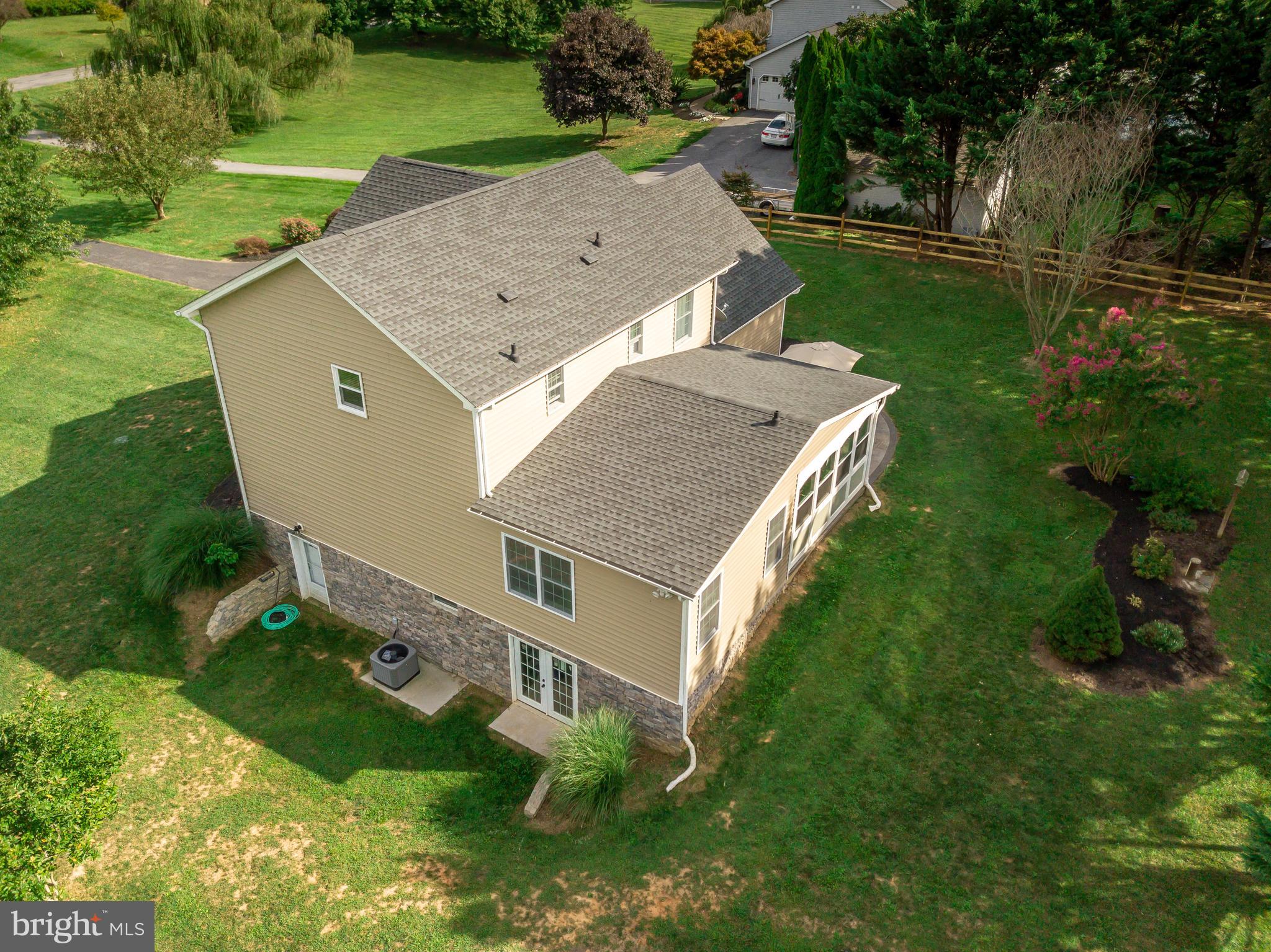 193 Quail Run Road Summit Point, WV 25446 - Photo 69 of 72 an aerial view of a house with yard