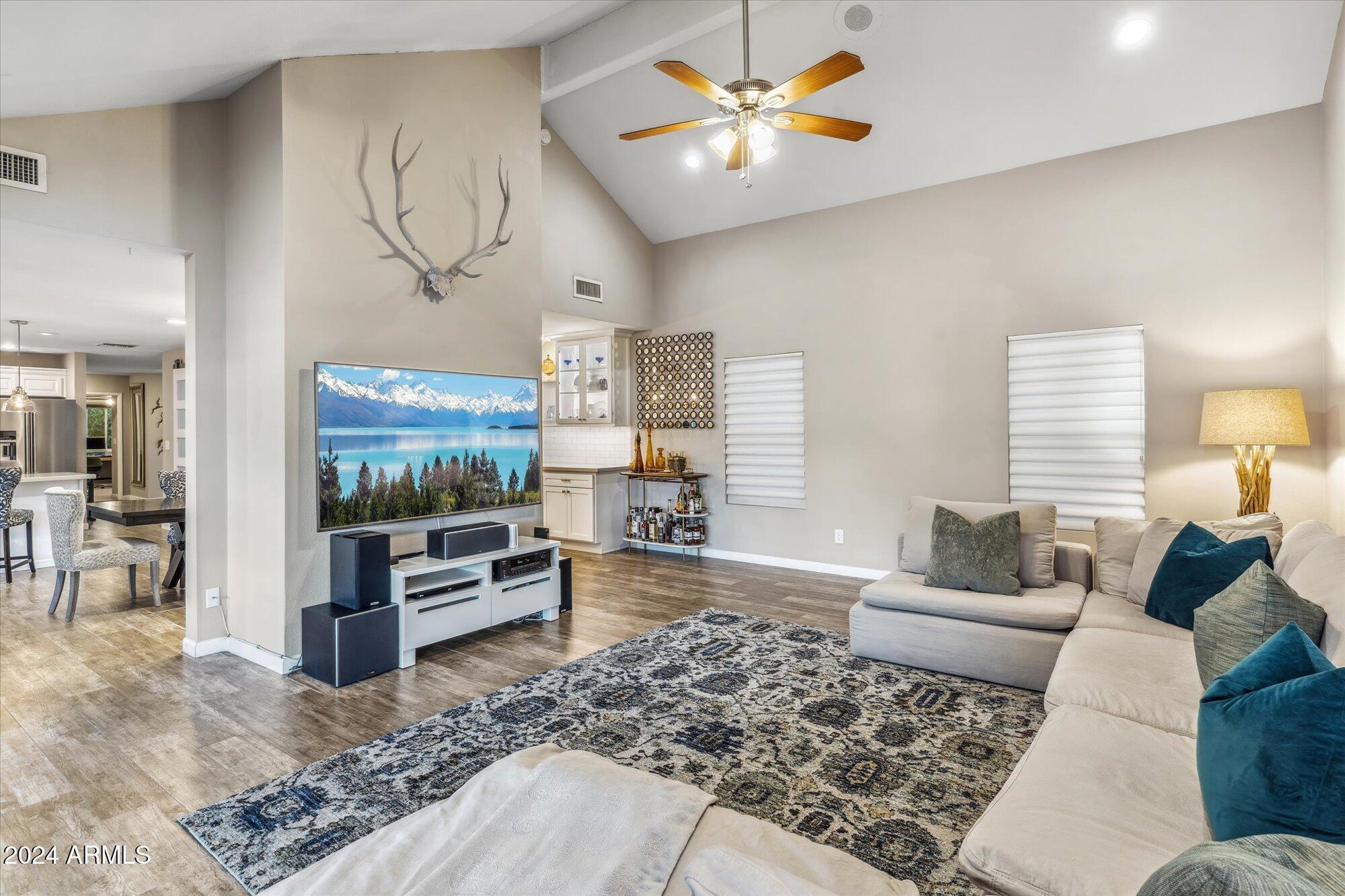 8019 North 7th Avenue Phoenix, AZ 85021 - Photo 17 of 43 a living room with furniture and a flat screen tv