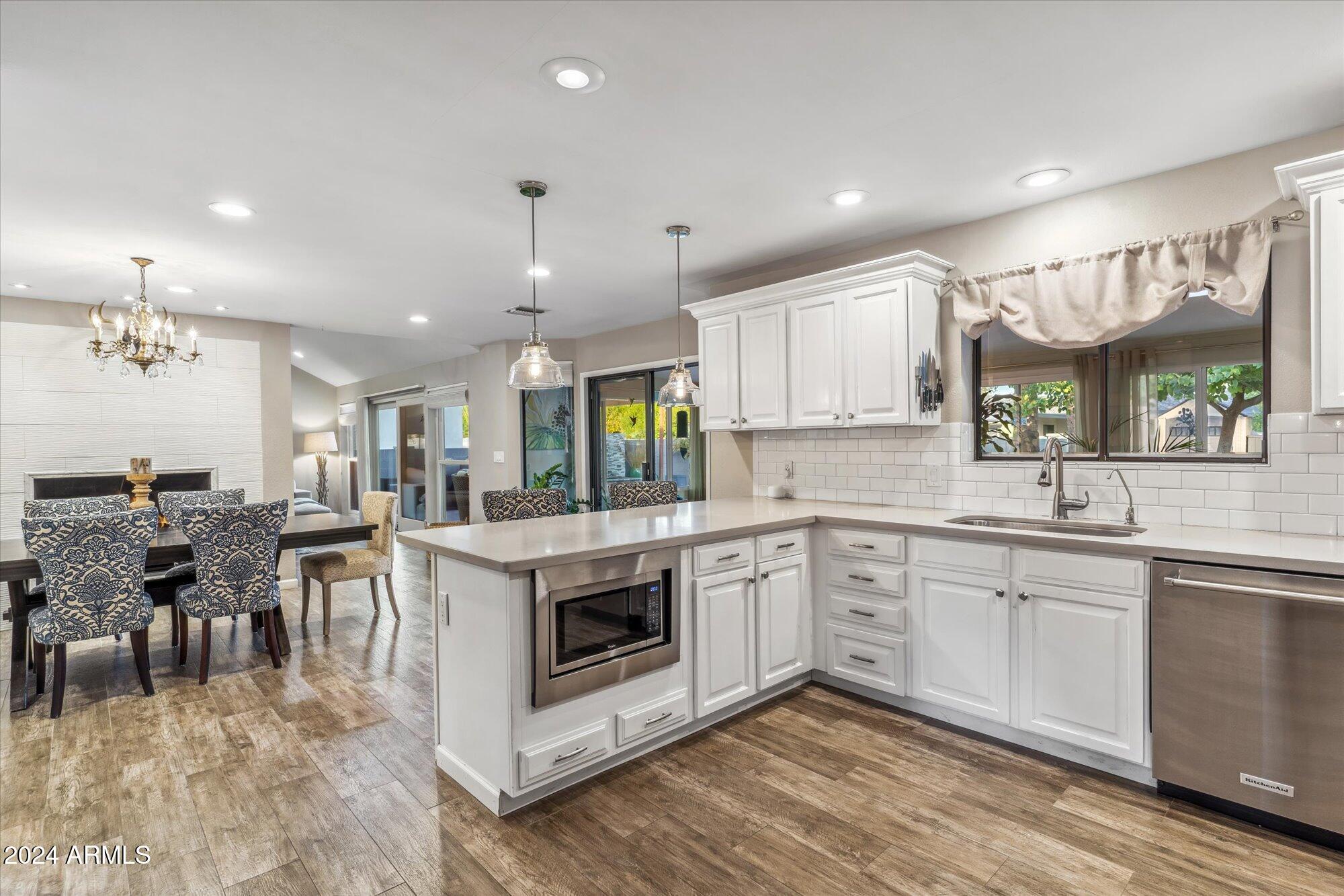 8019 North 7th Avenue Phoenix, AZ 85021 - Photo 18 of 43 a kitchen with lots of counter top space and sink