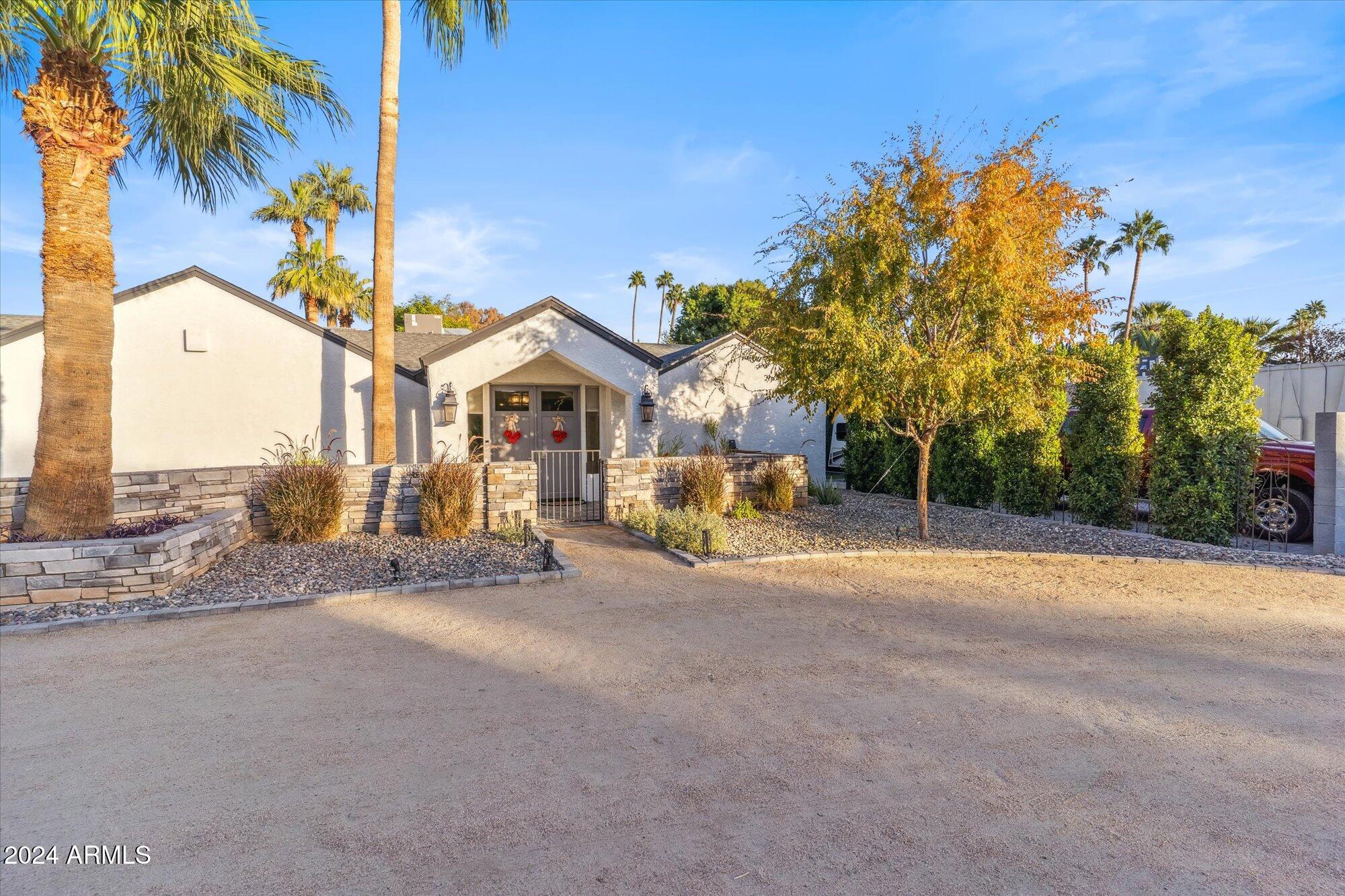 8019 North 7th Avenue Phoenix, AZ 85021 - Photo 2 of 43 a view of a street with a building in the background