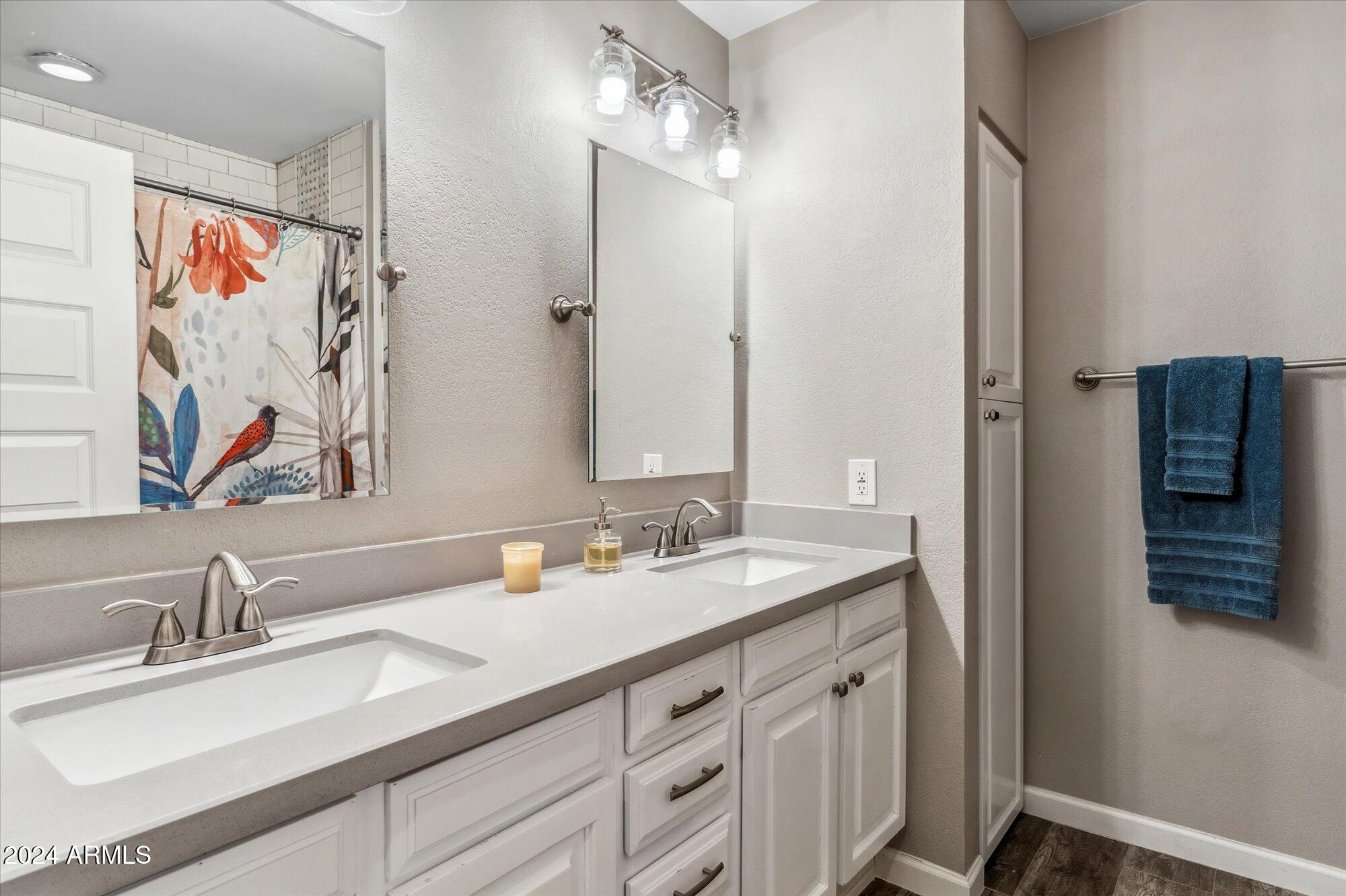 8019 North 7th Avenue Phoenix, AZ 85021 - Photo 25 of 43 a bathroom with a double vanity sink mirror and double