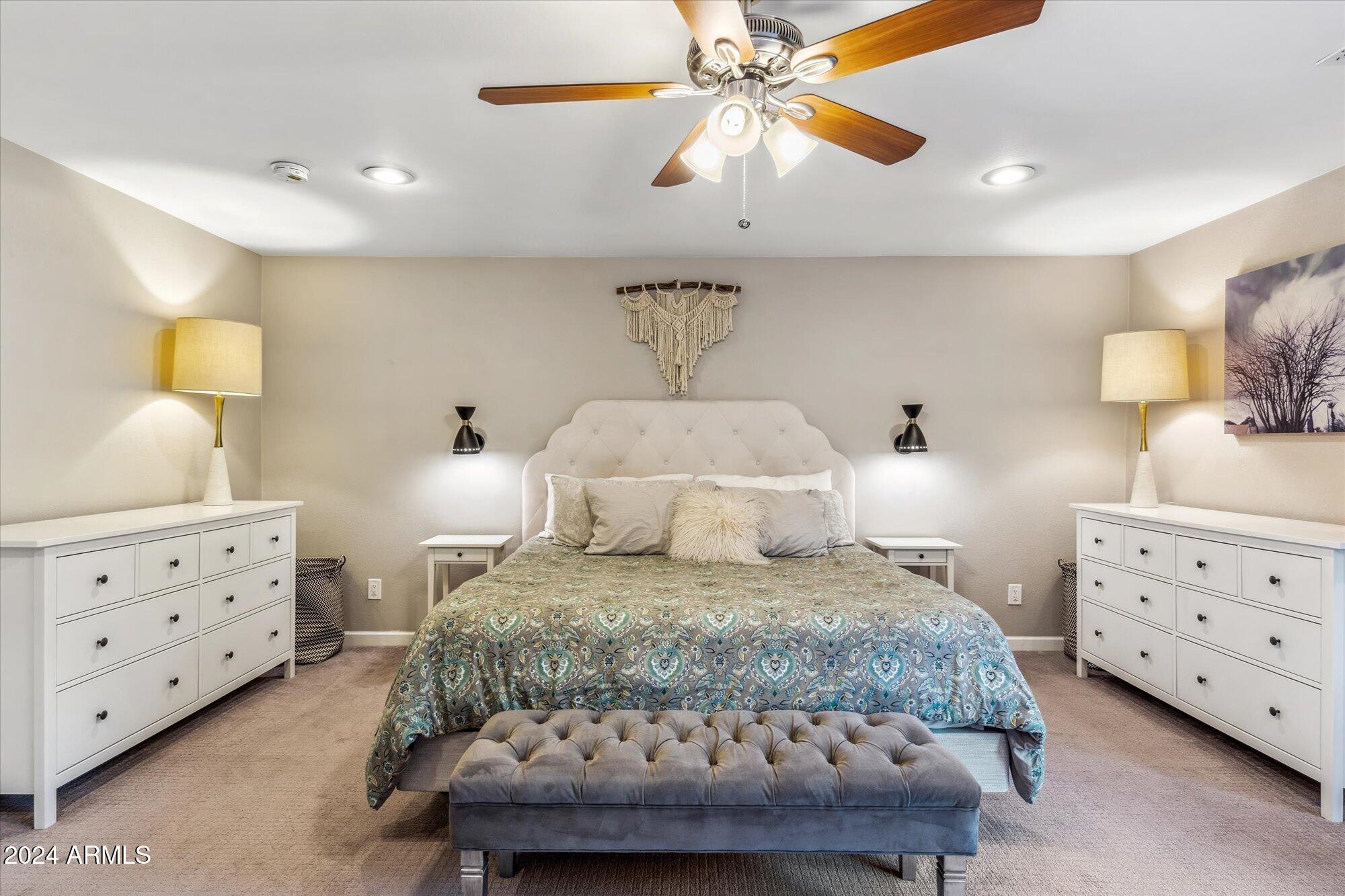 8019 North 7th Avenue Phoenix, AZ 85021 - Photo 29 of 43 a bedroom with a bed and a chandelier