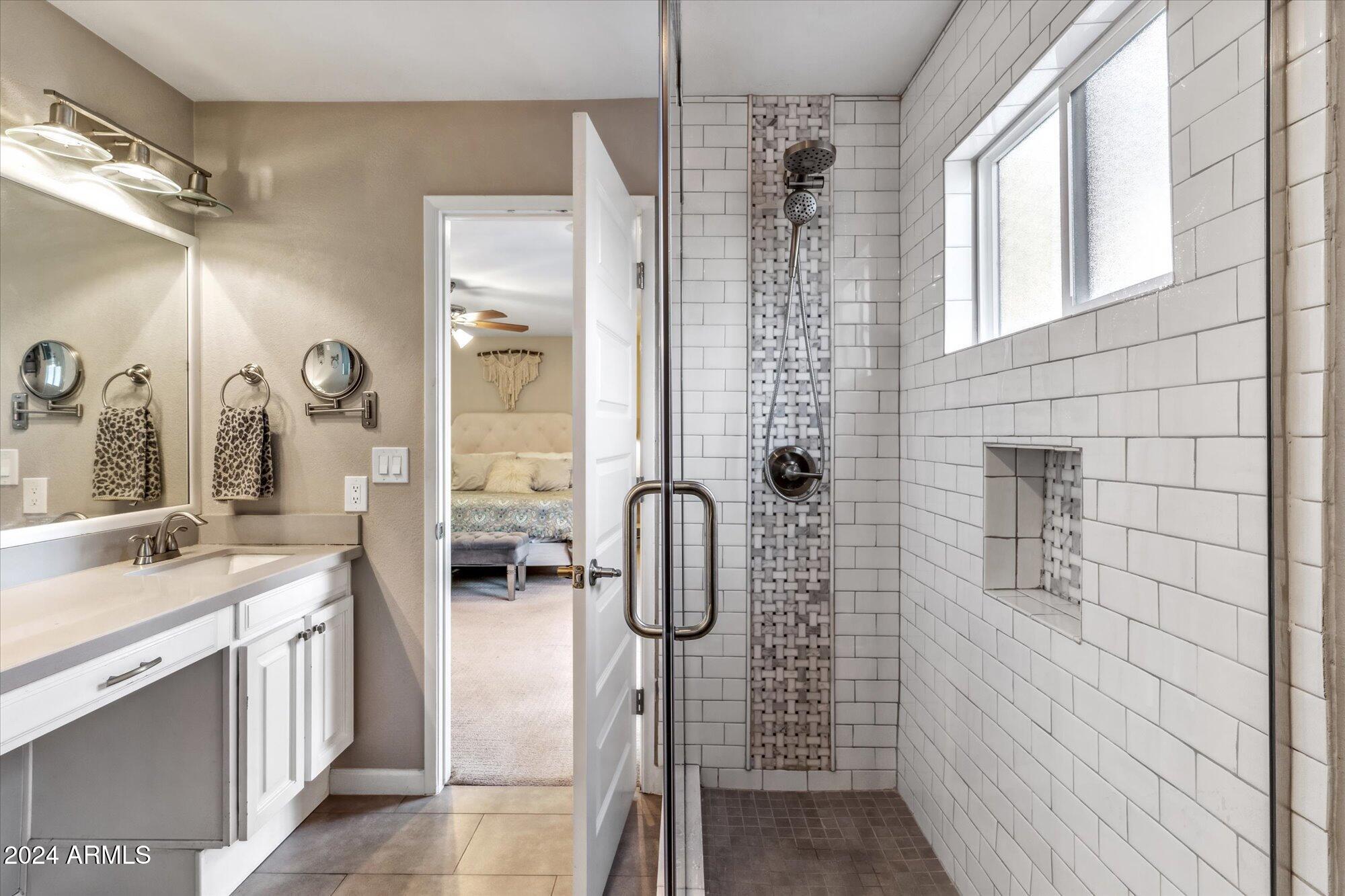 8019 North 7th Avenue Phoenix, AZ 85021 - Photo 32 of 43 a bathroom with a shower and a sink