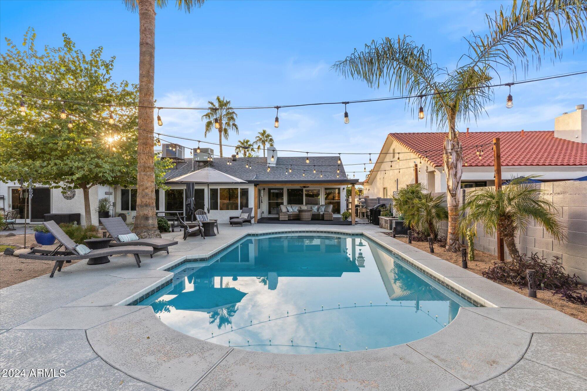 8019 North 7th Avenue Phoenix, AZ 85021 - Photo 35 of 43 an outdoor space with swimming pool and furniture