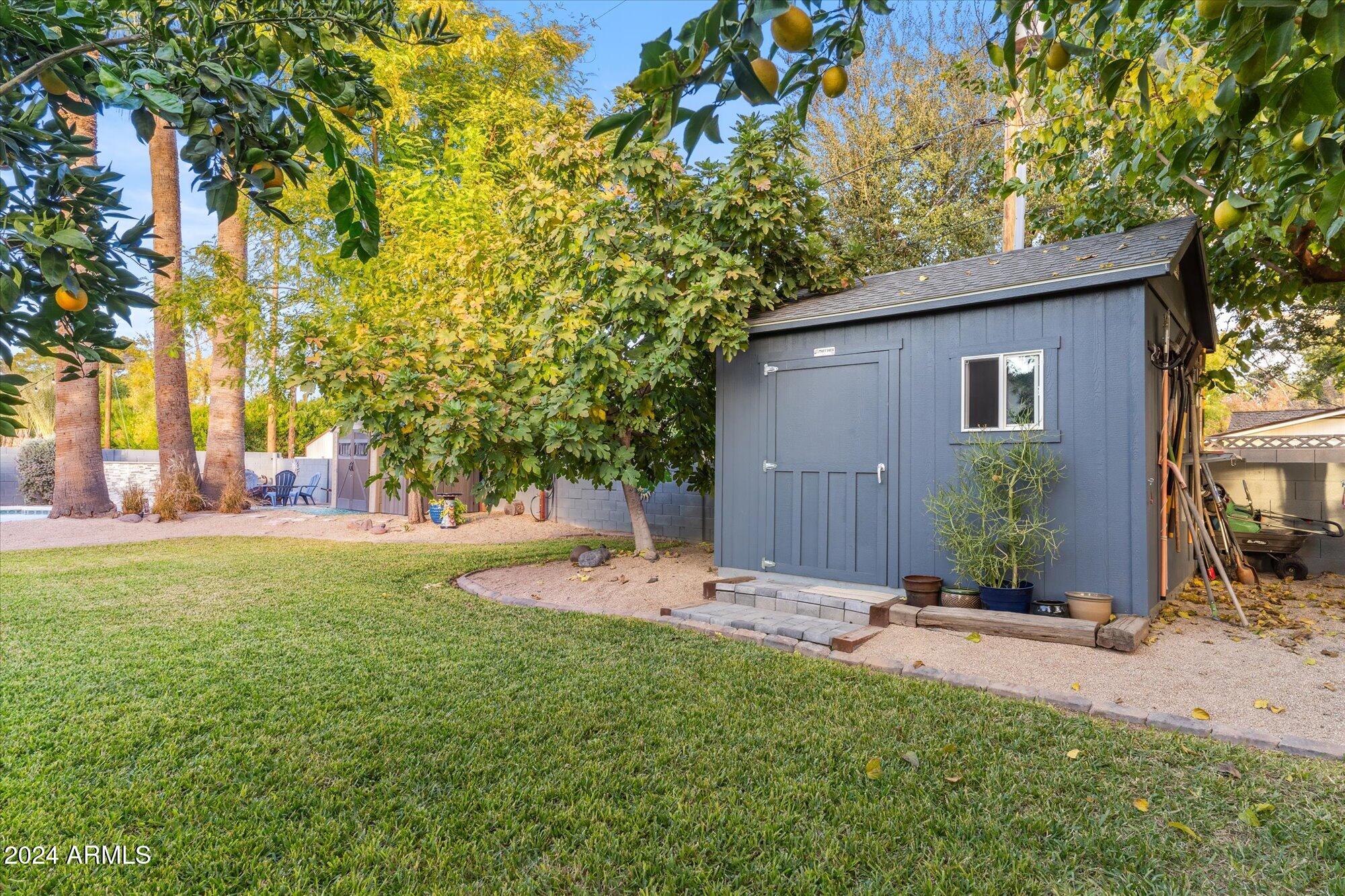 8019 North 7th Avenue Phoenix, AZ 85021 - Photo 39 of 43 a view of backyard of house with wooden fence