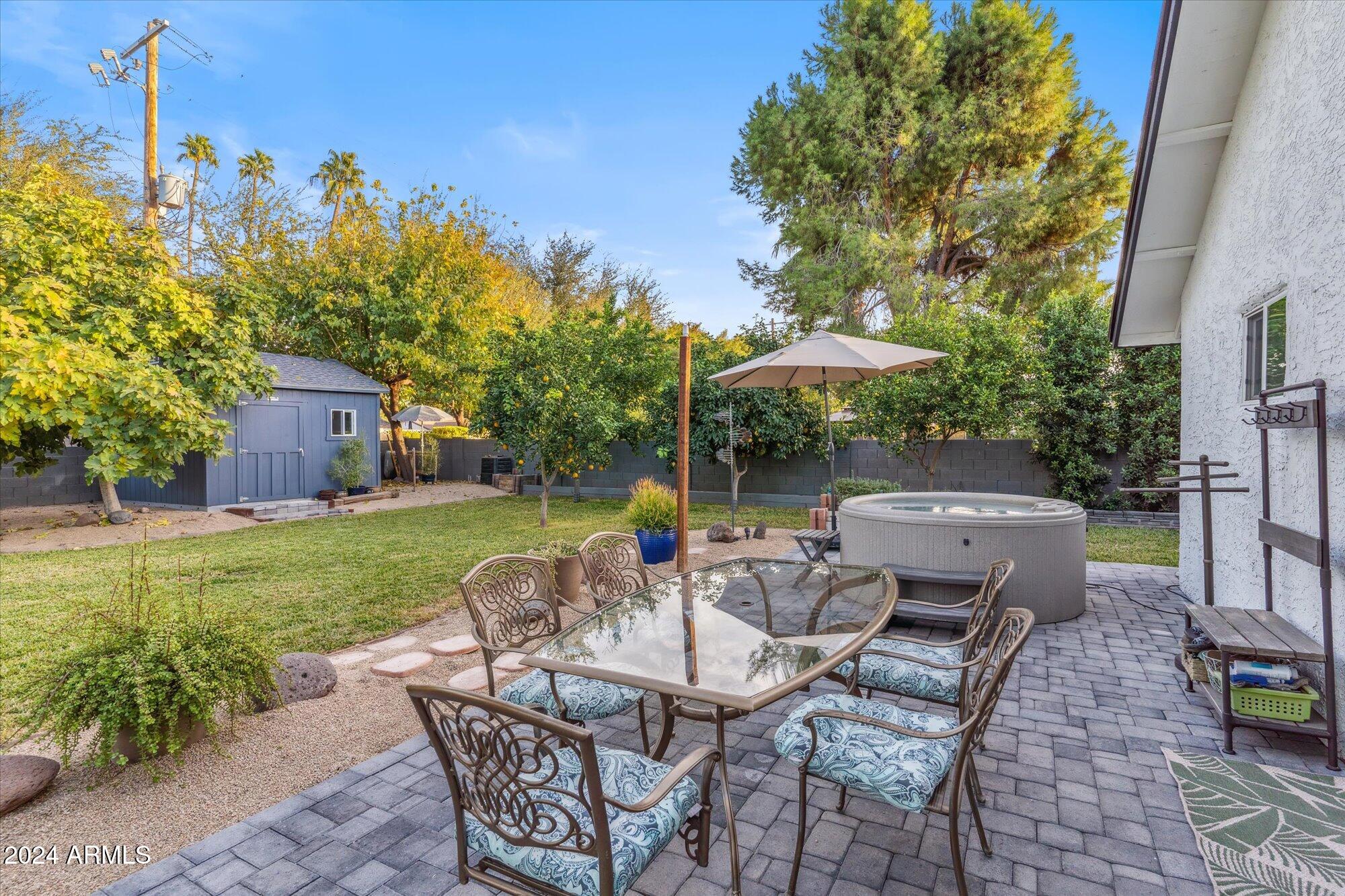 8019 North 7th Avenue Phoenix, AZ 85021 - Photo 42 of 43 a backyard of a house with table and chairs