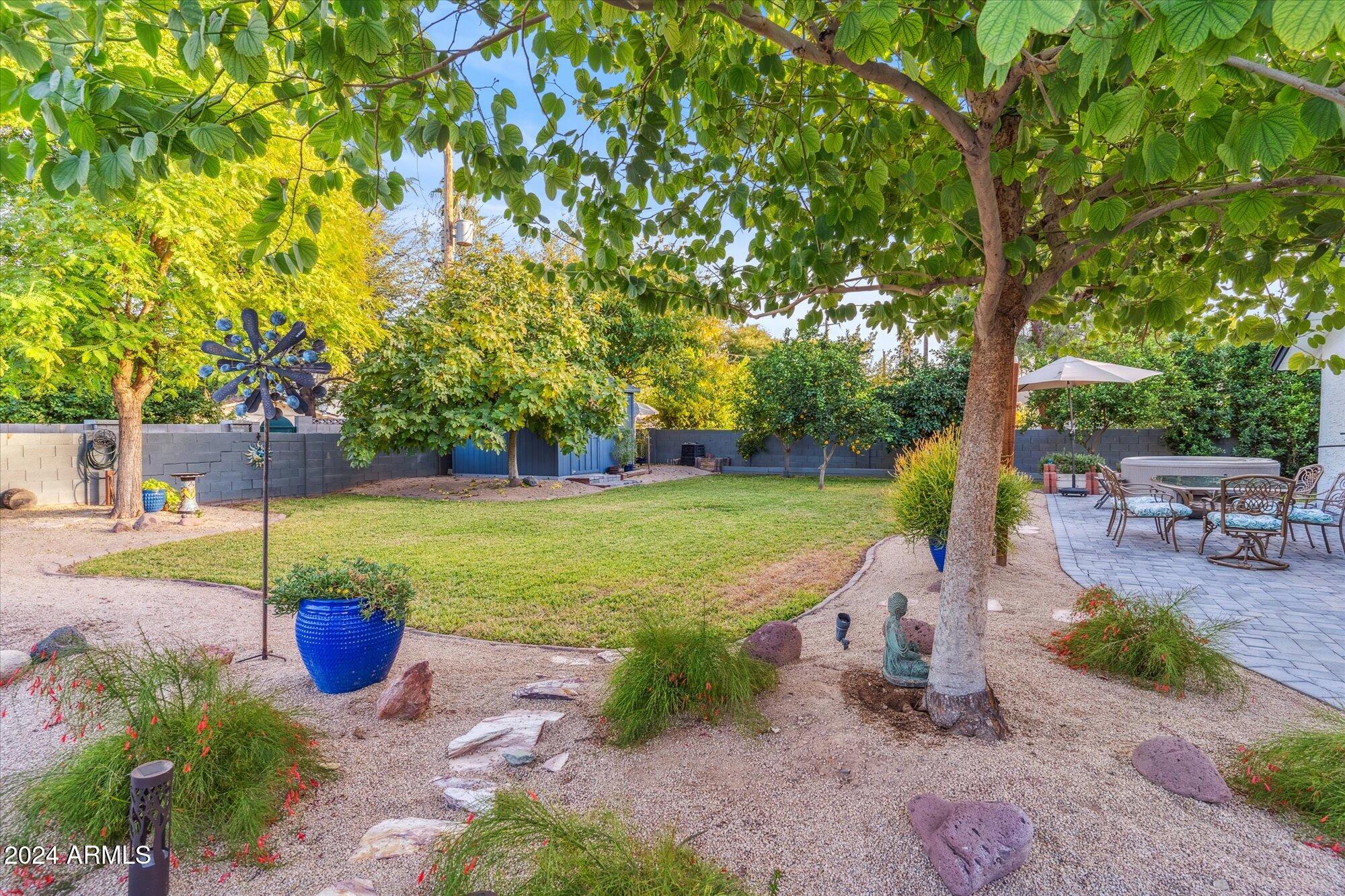 8019 North 7th Avenue Phoenix, AZ 85021 - Photo 43 of 43 a view of a garden with plants and a slide