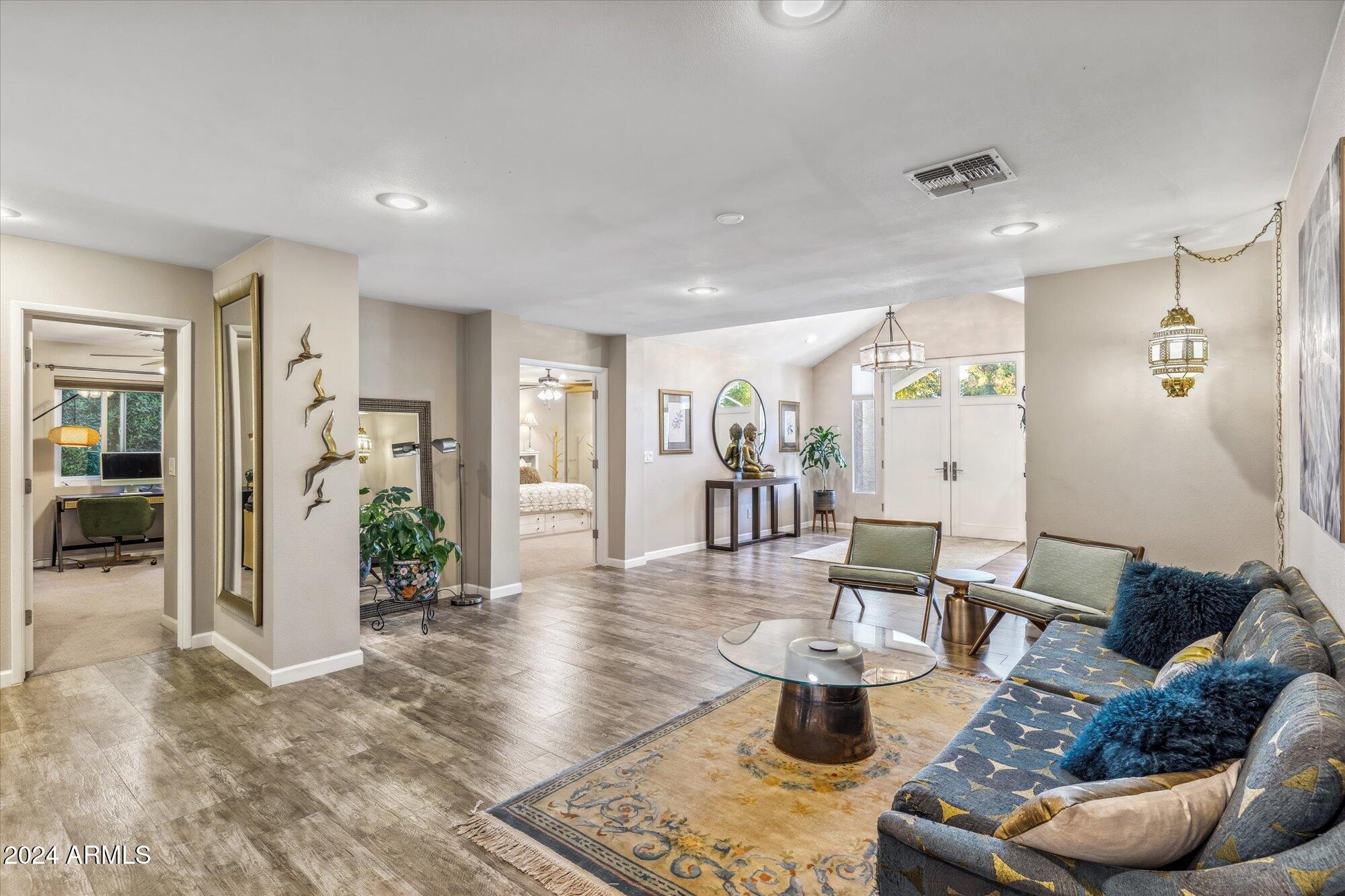 8019 North 7th Avenue Phoenix, AZ 85021 - Photo 8 of 43 a living room with furniture and wooden table