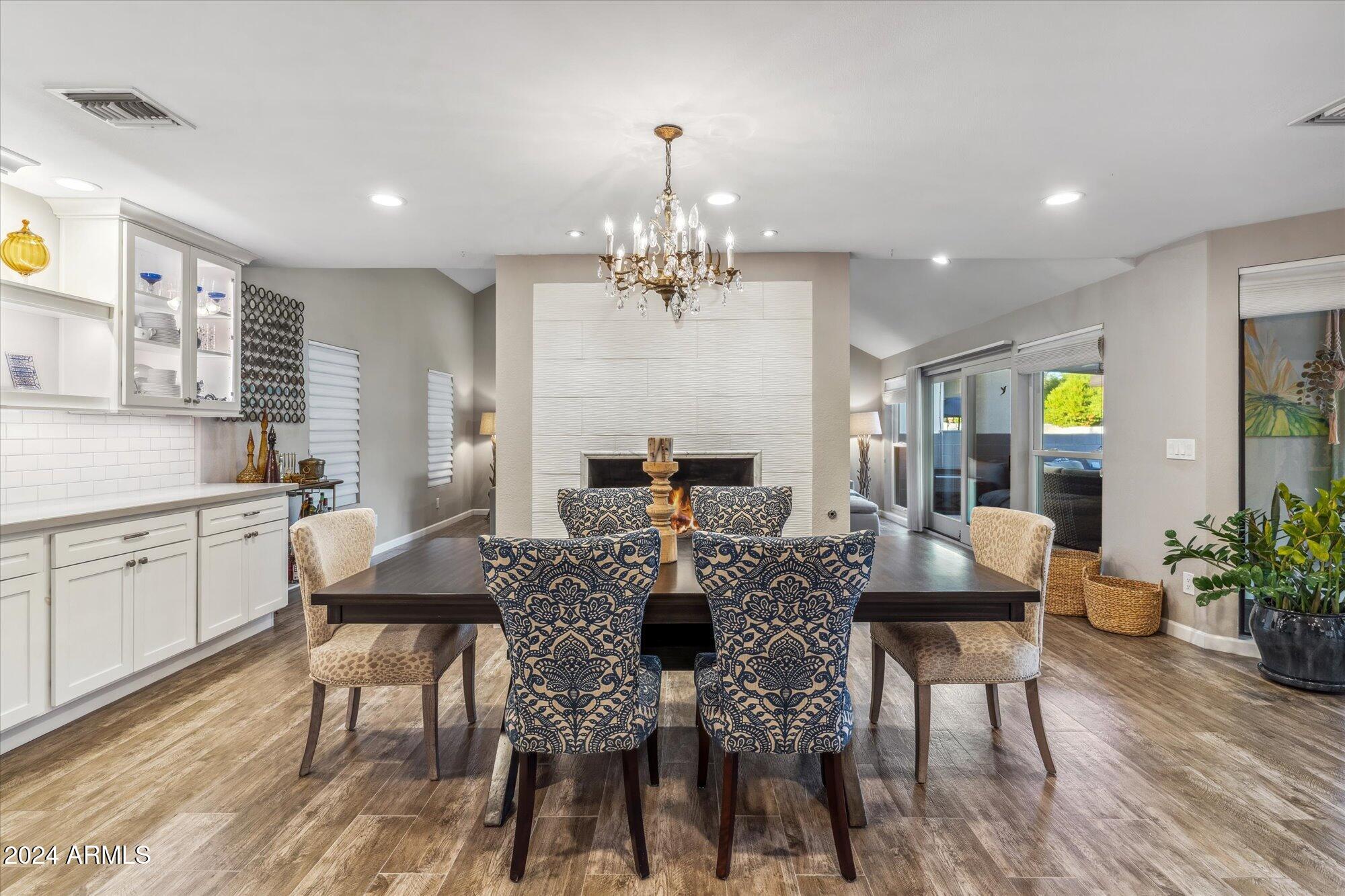 8019 North 7th Avenue Phoenix, AZ 85021 - Photo 9 of 43 a view of a dining room with furniture window and wooden floor