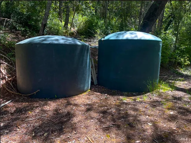 a view of swimming pool with a yard