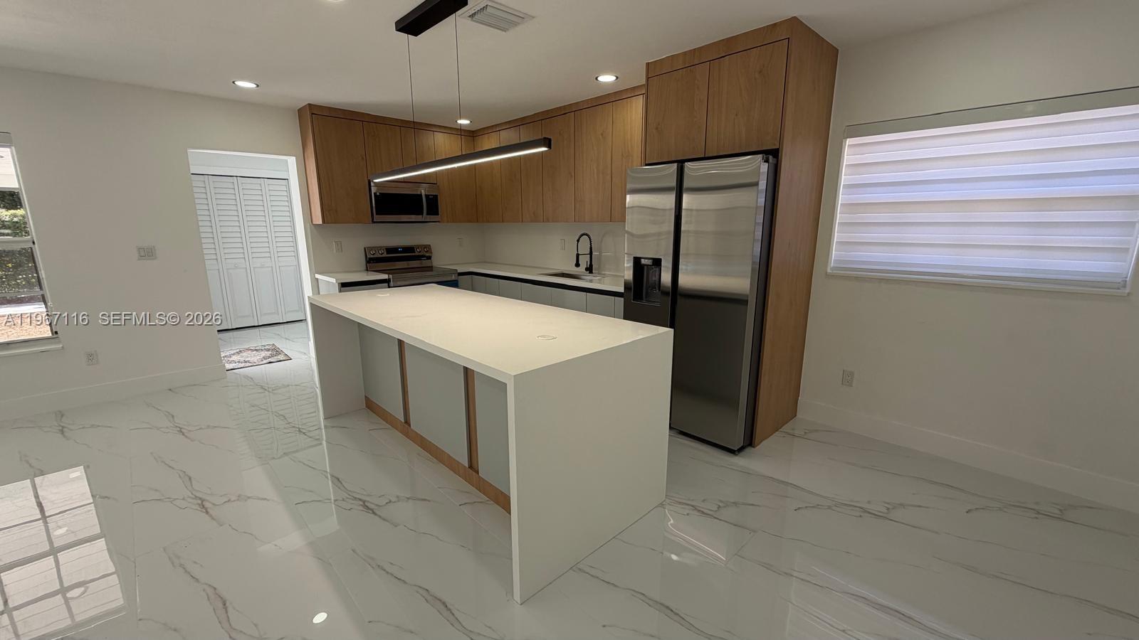 9620 Southwest 9th Terrace Miami, FL 33174 - Photo 14 of 26 a view of a kitchen with a sink