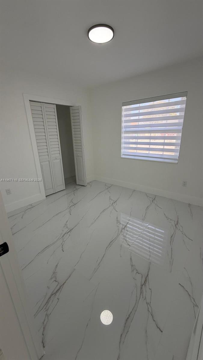 9620 Southwest 9th Terrace Miami, FL 33174 - Photo 8 of 26 an empty room with windows