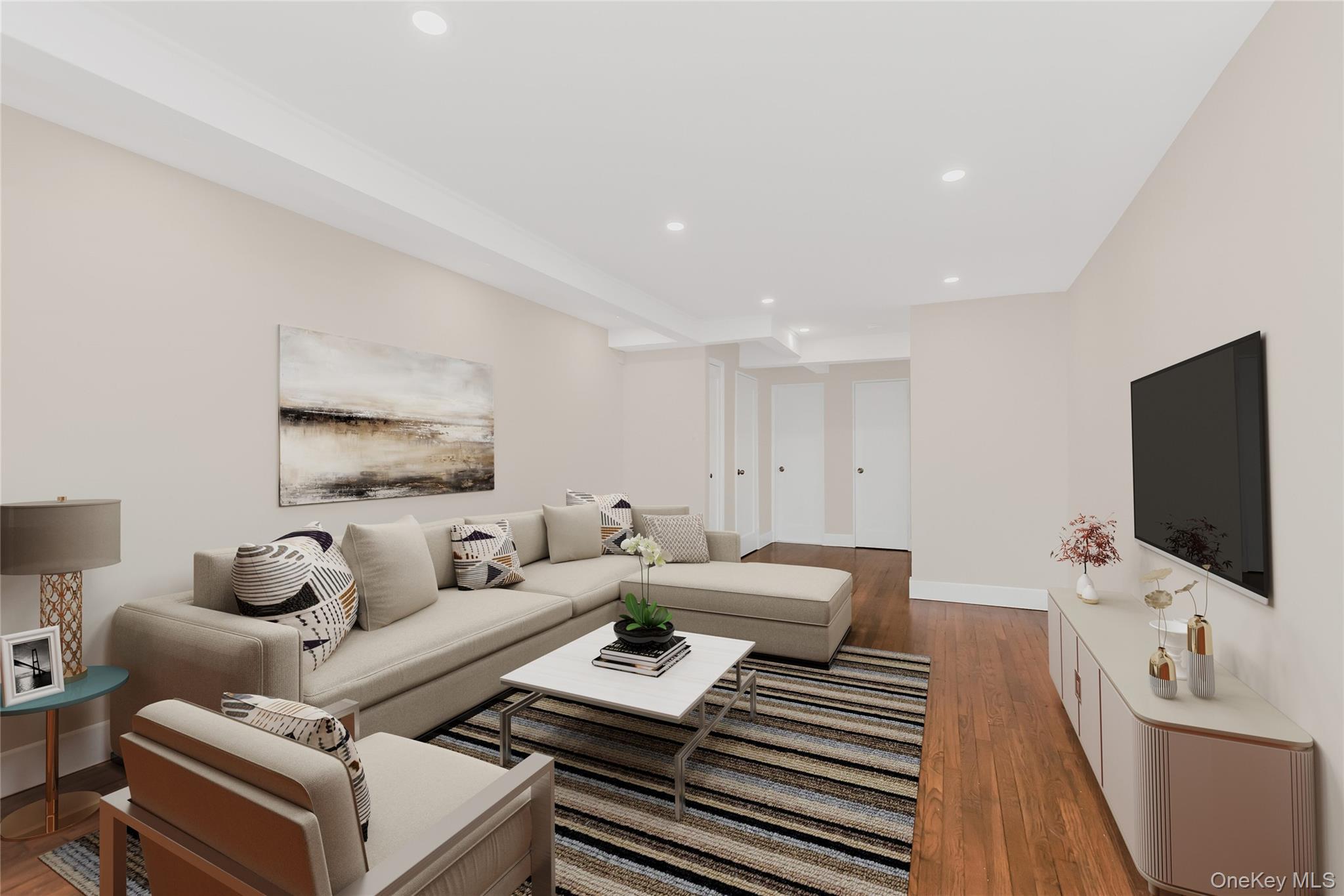 a living room with furniture and a flat screen tv