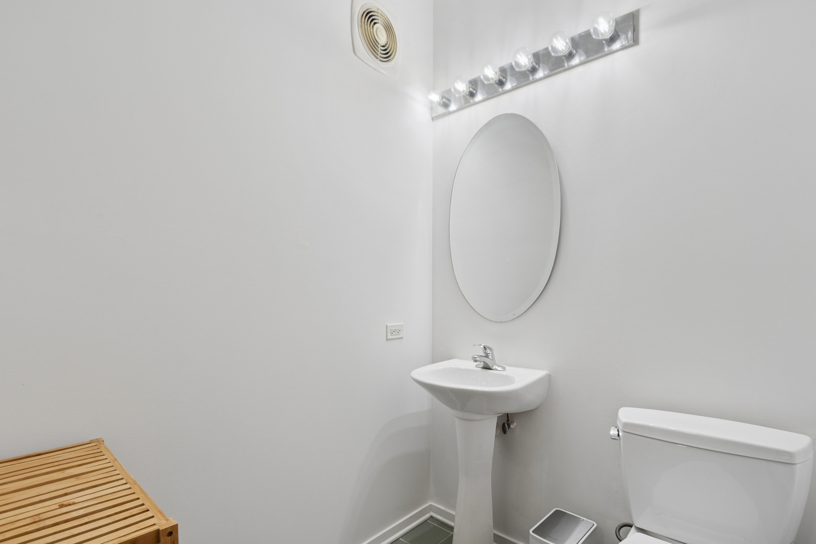 700 West Van Buren Street, Unit 1105 Chicago, IL 60607 - Photo 2 of 19 a bathroom with a sink and a mirror