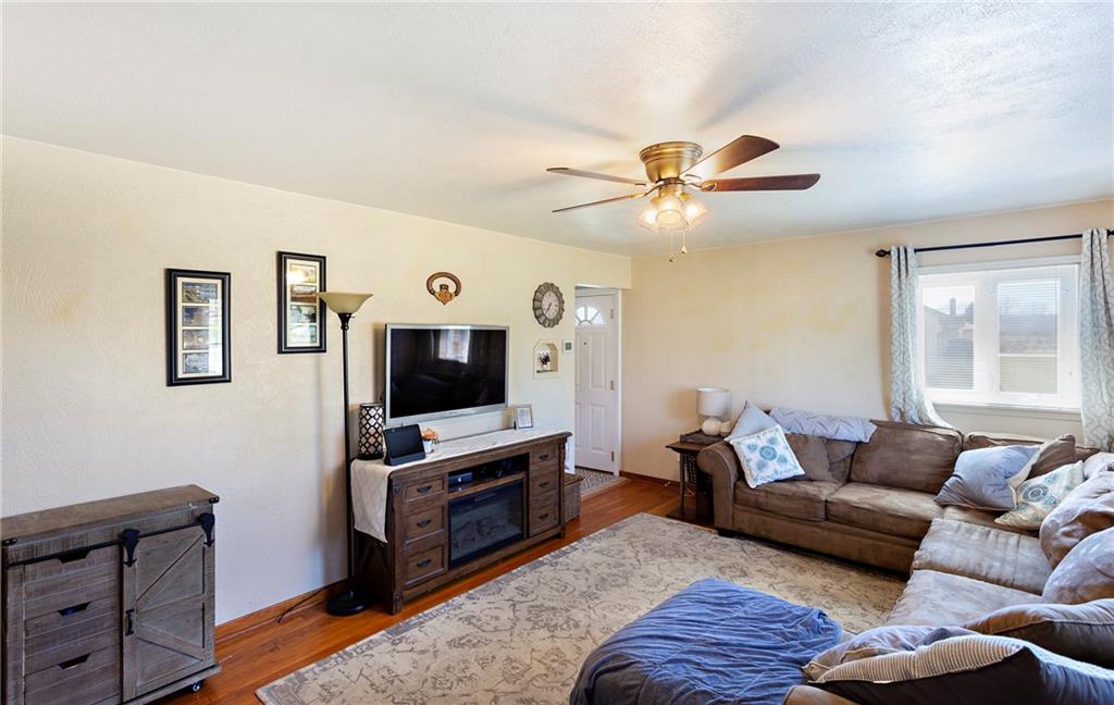 317 Murrysville Road Trafford, PA 15085 - Photo 3 of 23 The bright and light Living room will be the center of your new home!