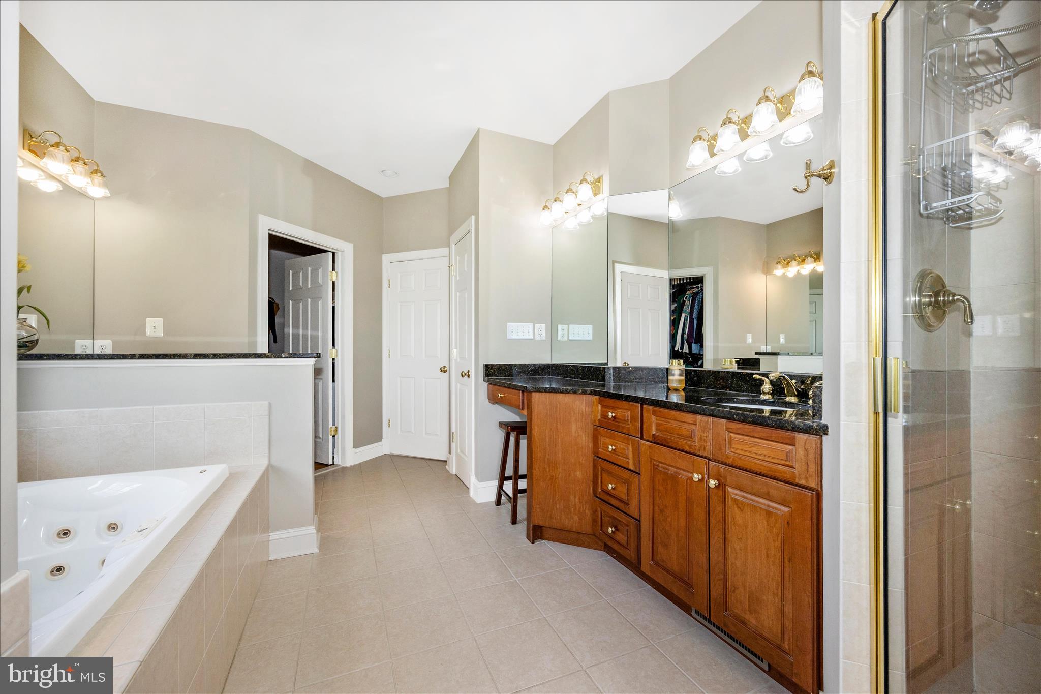 14746 New Windsor Road New Windsor, MD 21776 - Photo 26 of 67 a large bathroom with a sink a large mirror and a shower