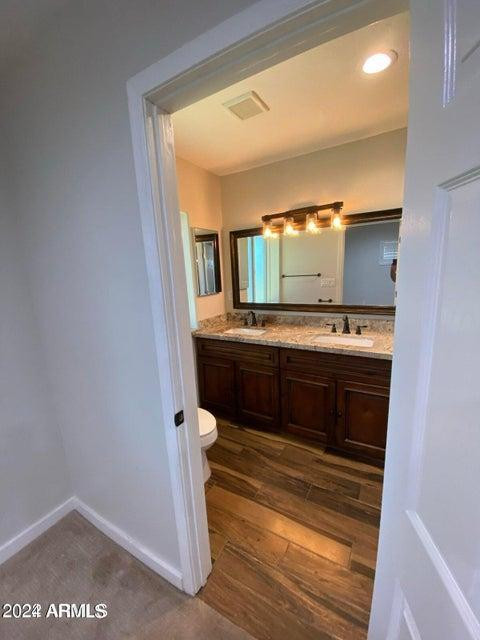 1011 West Northern Avenue Phoenix, AZ 85021 - Photo 17 of 25 a bathroom with a sink and a mirror