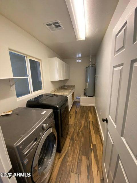 1011 West Northern Avenue Phoenix, AZ 85021 - Photo 19 of 25 a view of a kitchen with a sink and wooden floor
