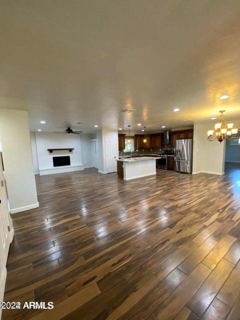 1011 West Northern Avenue Phoenix, AZ 85021 - Photo 2 of 25 a view of kitchen with cabinets and wooden floor
