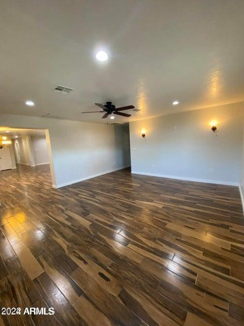 1011 West Northern Avenue Phoenix, AZ 85021 - Photo 6 of 25 a view of a room with wooden floor