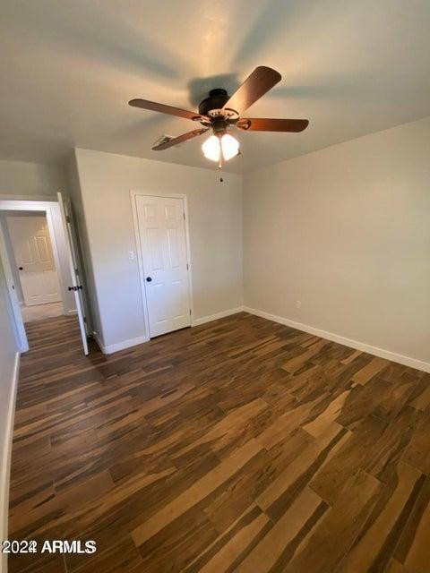 1011 West Northern Avenue Phoenix, AZ 85021 - Photo 10 of 25 a view of a room with wooden floor