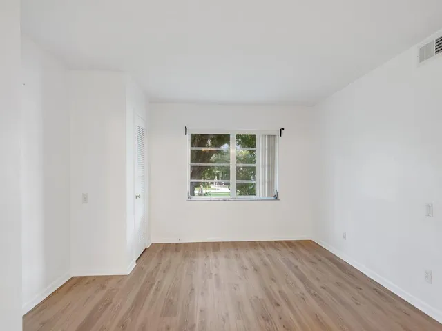 a utility room with sink dryer and washer