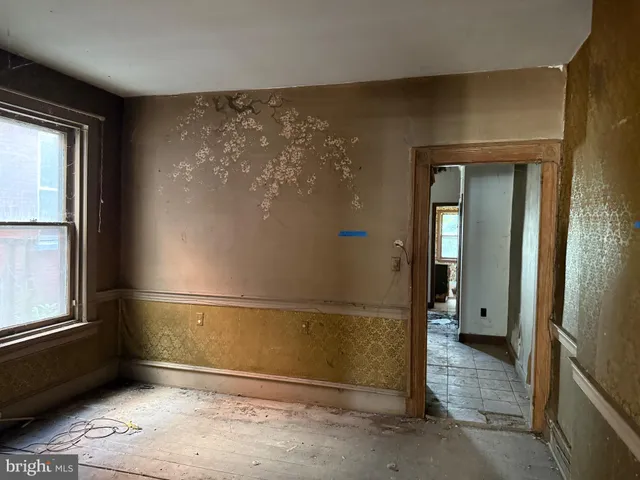 a view of a house with a tree