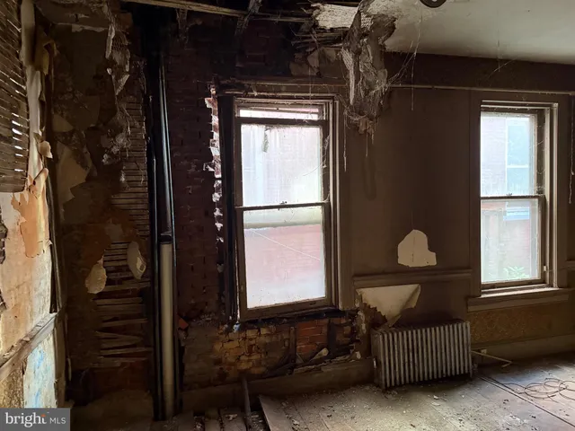 a view of a backyard of a house