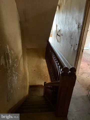a utility room with a window and a sink
