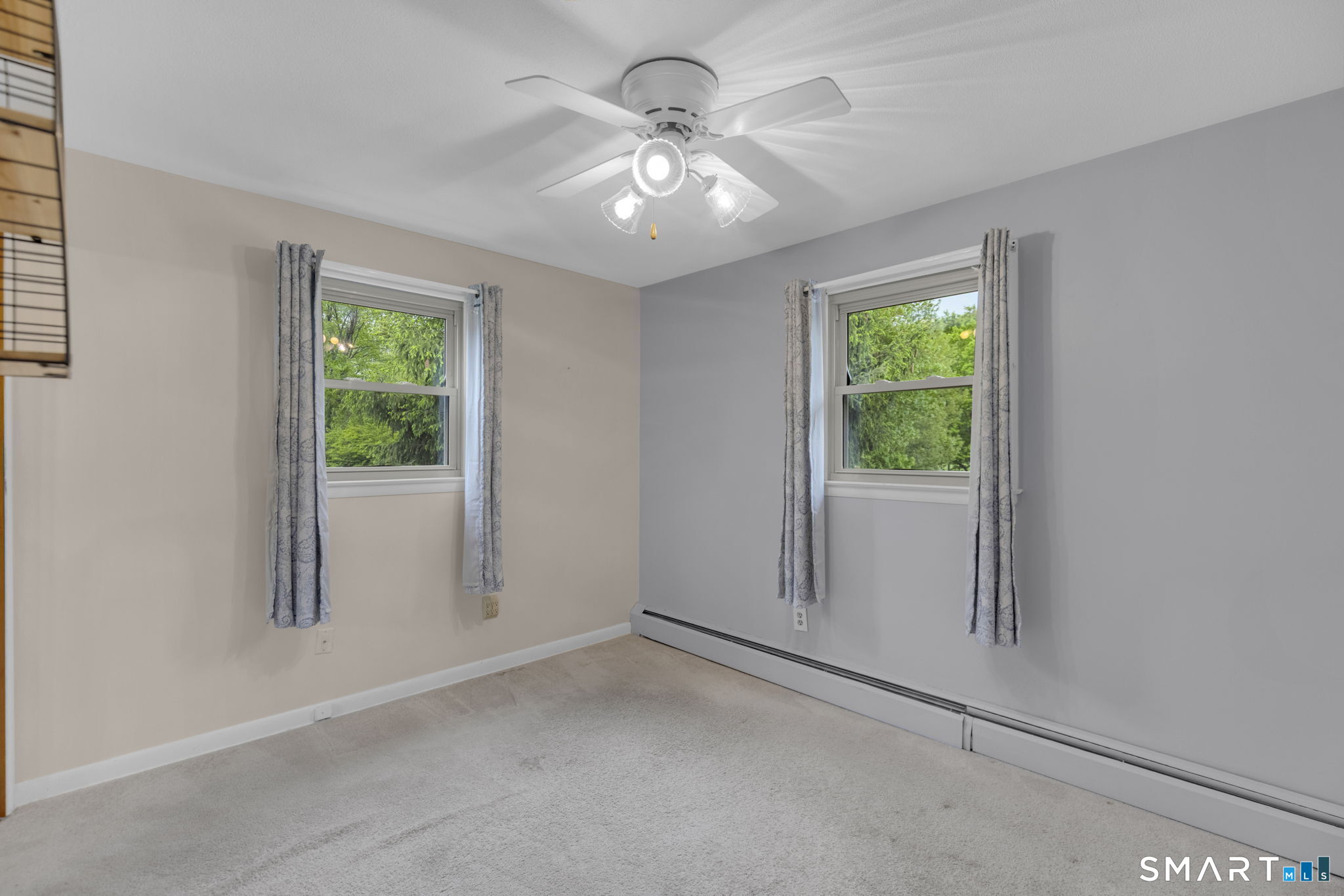 102 Wayne Lane Meriden, CT 06450 - Photo 19 of 36 a view of a livingroom with a ceiling fan and window