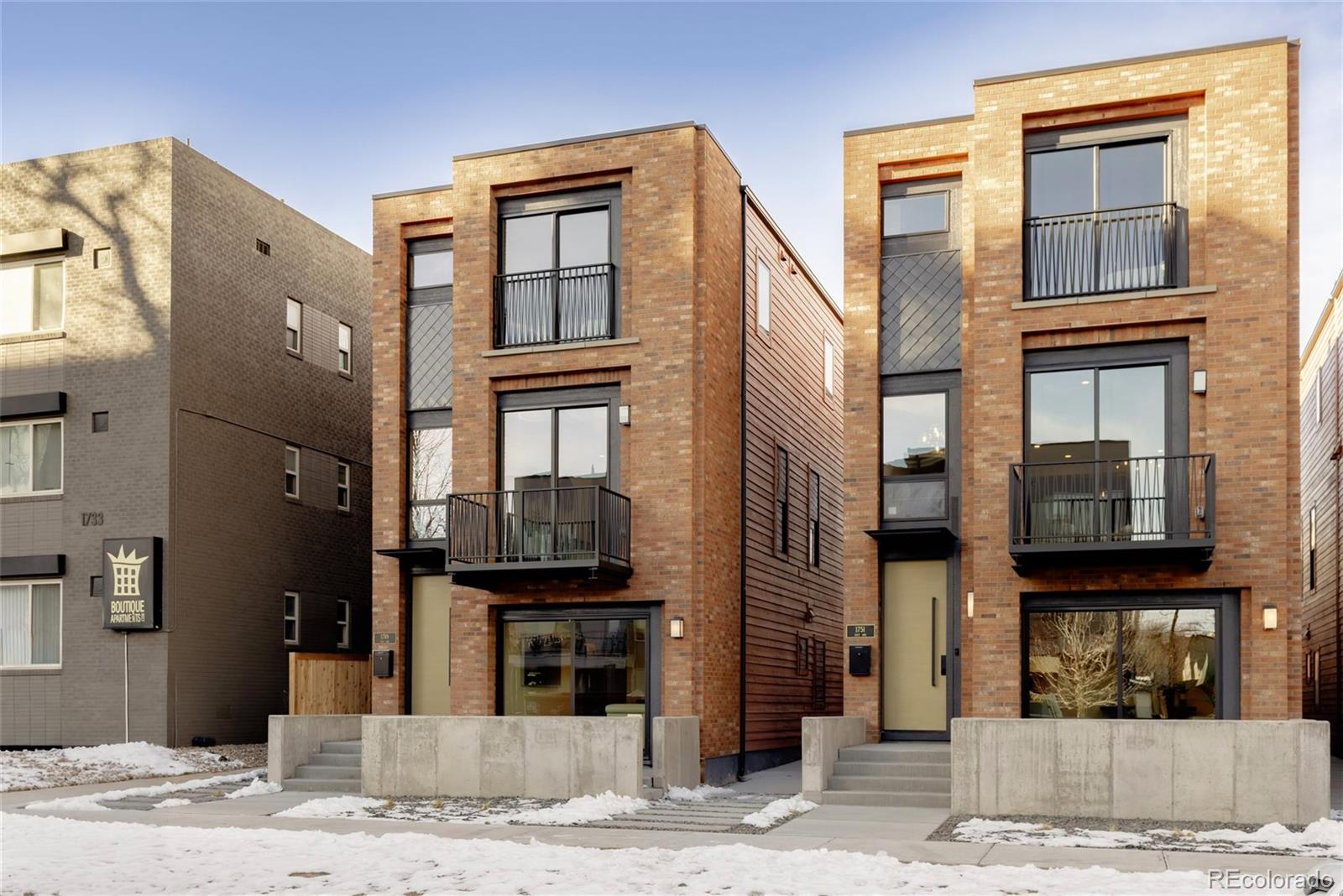 a front view of a building and a street