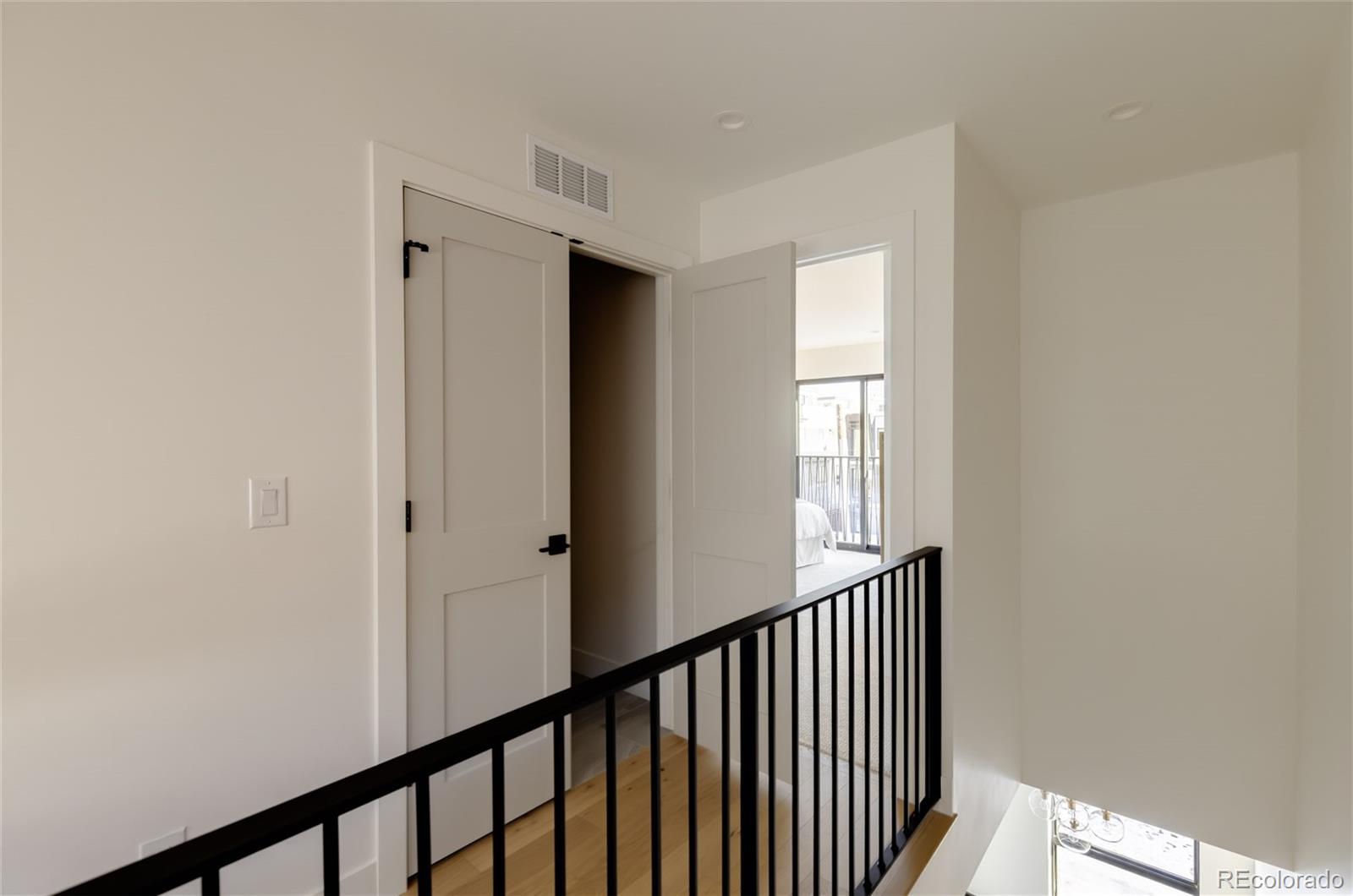 1749 North Williams Street, Unit 2 Denver, CO 80218 - Photo 16 of 34 a view of a hallway with wooden floor and entryway