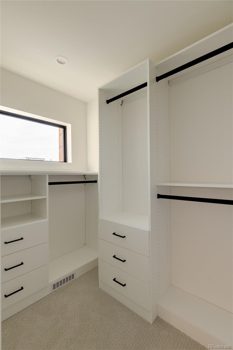 1749 North Williams Street, Unit 2 Denver, CO 80218 - Photo 18 of 34 a view of an empty walk in closet