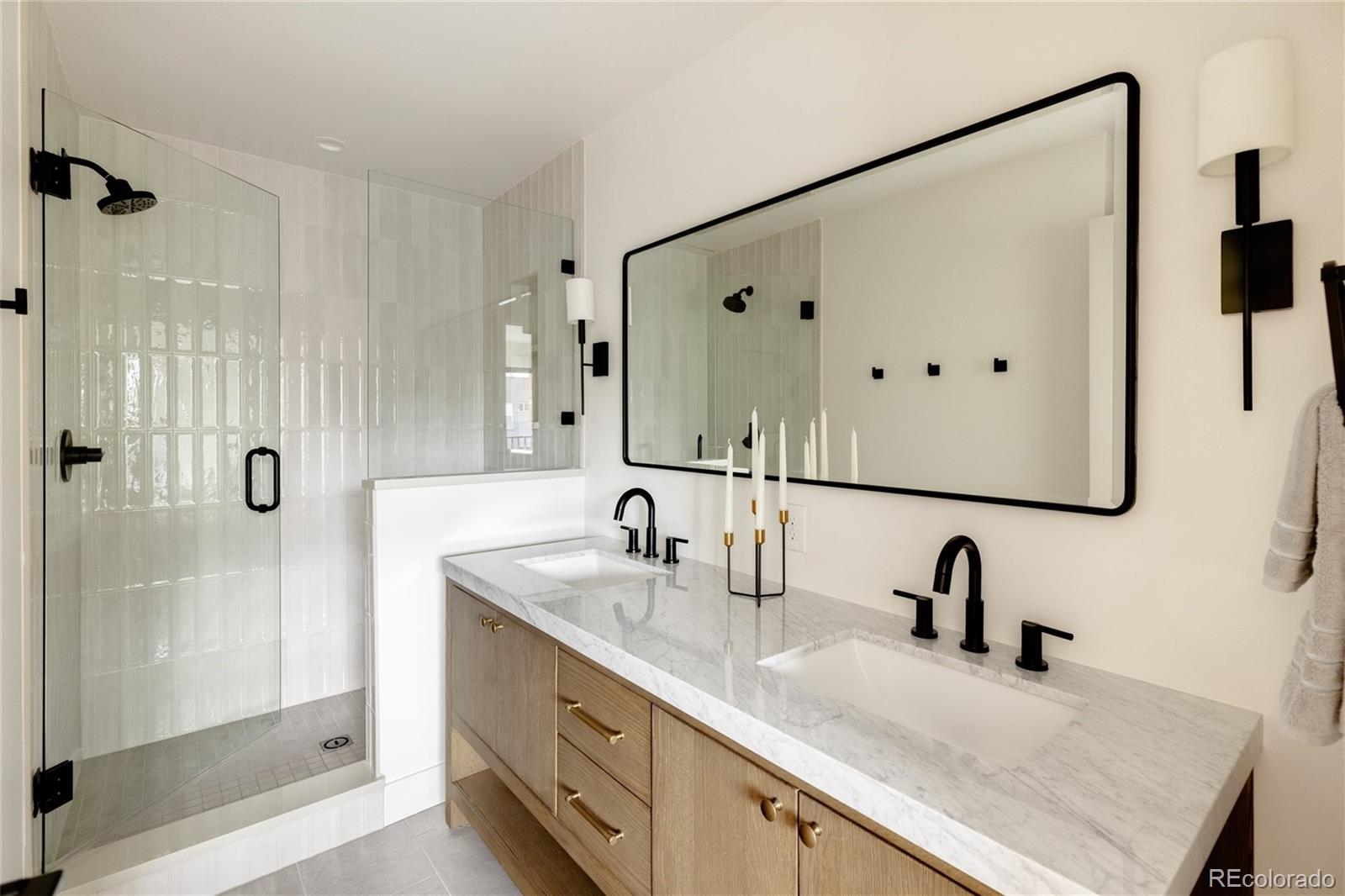 1749 North Williams Street, Unit 2 Denver, CO 80218 - Photo 19 of 34 a bathroom with a sink and a mirror